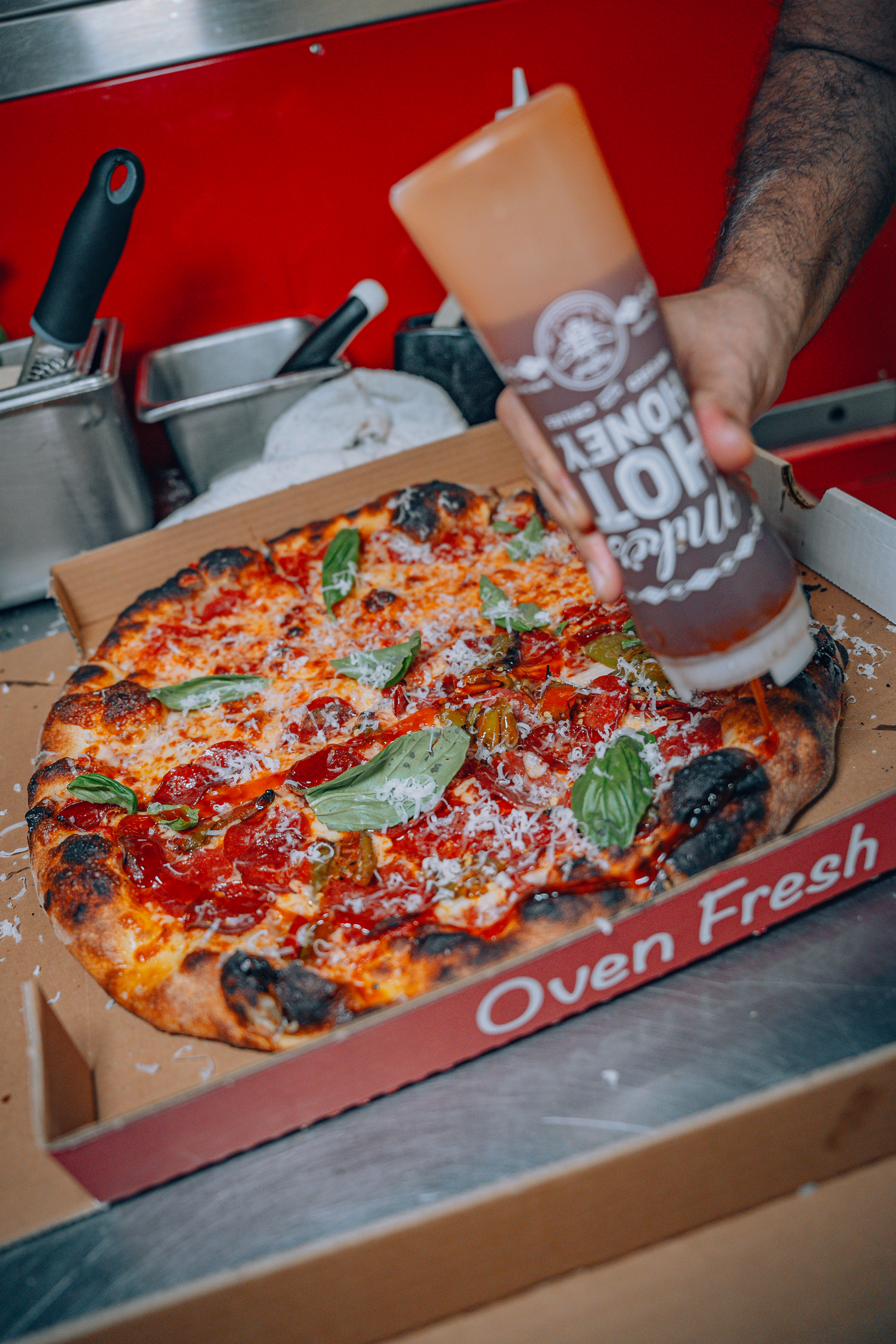 Spicy Pepperoni pizza with Mike's Hot Honey